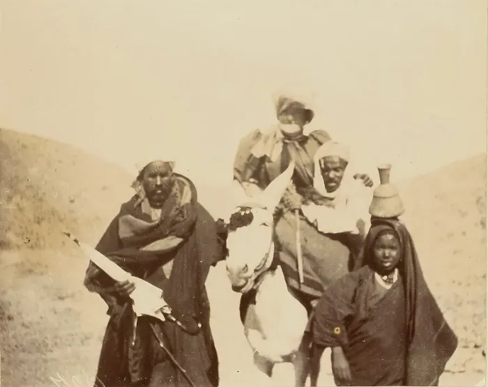 Framed Print : Men with woman riding mule, about 1860-1880. Creator: Unknown Framed Print : Men with woman riding mule, about 1860-1880. Creator: Unknown