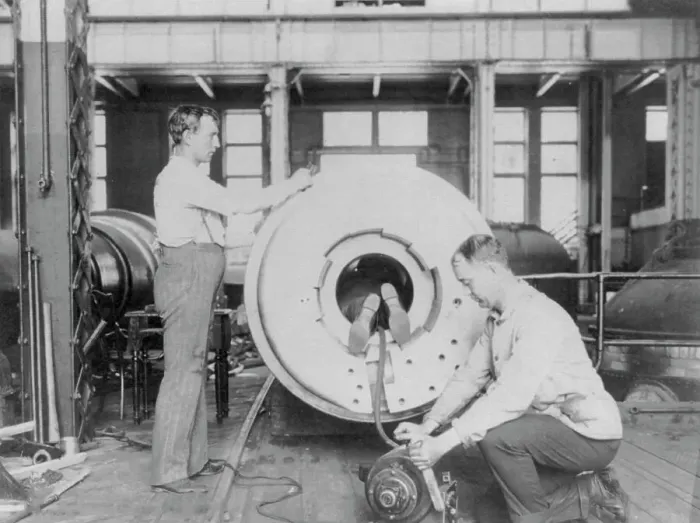 Framed Print : Three men working on large gun in Naval Gun Factory, Washington, D.C. one of the men lying... 1903 Creator: Frances Benjamin Johnston Framed Print : Three men working on large gun in Naval Gun Factory, Washington, D.C. one of the men lying... 1903 Creator: Frances Benjamin Johnston