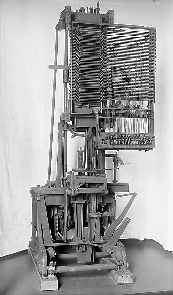 Mergenthaler, Ottmar, 2nd Linotype Machine with Band, Invented By Him; 3rd Design He... 1917. Creator: Harris & Ewing. Mergenthaler, Ottmar, 2nd Linotype Machine with Band, Invented By Him; 3rd Design He... 1917. Creator: Harris & Ewing