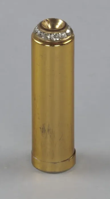Framed Print : Metal lipstick holder from Maes Millinery Shop, 1941-1994. Creator: Unknown Framed Print : Metal lipstick holder from Maes Millinery Shop, 1941-1994. Creator: Unknown