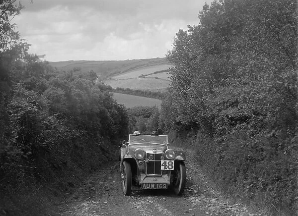MG Magna competing in the Mid Surrey AC Barnstaple Trial, 1934. Artist: Bill Brunell