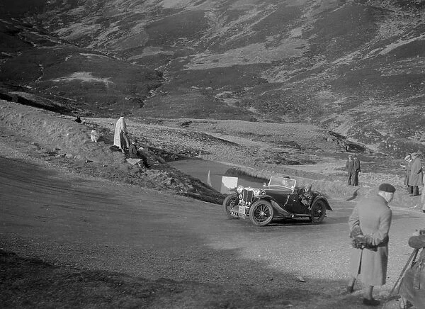 MG PA of A Cairns at the RSAC Scottish Rally, Devils Elbow, Glenshee, 1934. Artist: Bill Brunell