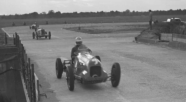 MG racing at Brooklands, Surrey, c1930s. Artist: Bill Brunell