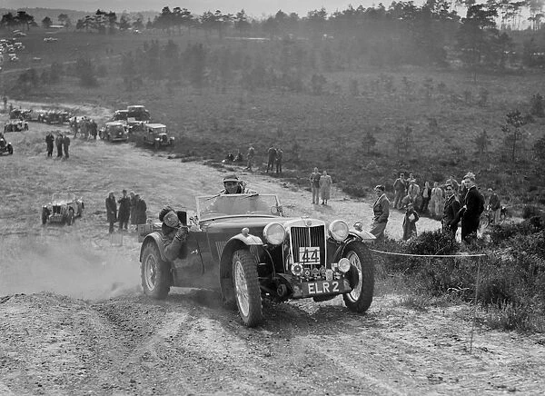 MG TA competing in the Great Weat Motor Club Trial, 1938. Artist: Bill Brunell