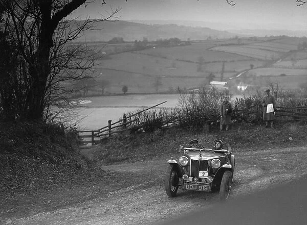MG TA of JL Lutwyche competing in the MG Car Club Midland Centre Trial, 1938. Artist: Bill Brunell