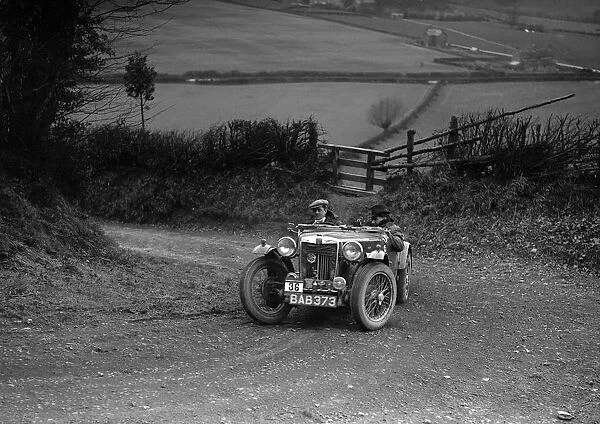 MG TA of NH Grove competing in the MG Car Club Midland Centre Trial, 1938. Artist: Bill Brunell