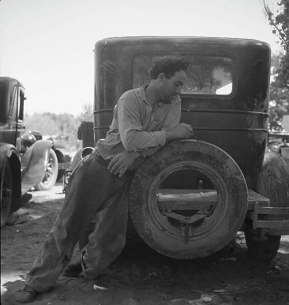 Migrant agricultural worker in Marysville migrant camp, California, 1935. Creator: Dorothea Lange
