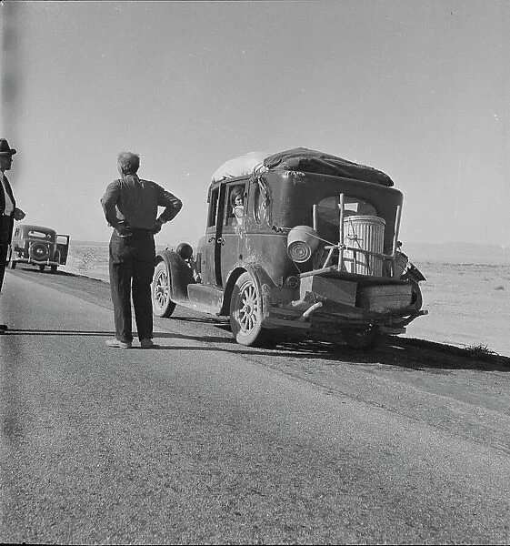 Migrant from Chickasaw, Oklahoma, stalled on the desert in southern California with no money, 1937. Creator: Dorothea Lange