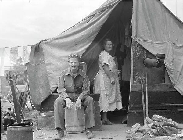Part of migrant family of five, encamped near Porterville, California, 1936. Creator: Dorothea Lange