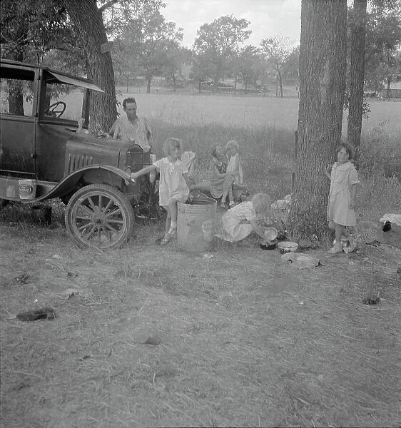 Migrant family from Oklahoma in Texas, 1936. Creator: Dorothea Lange