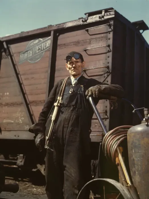 Framed Print : Mike Evans, a welder, at the rip tracks at Proviso yard of the C & NW RR, Chicago, Ill. 1943. Creator: Jack Delano Framed Print : Mike Evans, a welder, at the rip tracks at Proviso yard of the C & NW RR, Chicago, Ill. 1943. Creator: Jack Delano