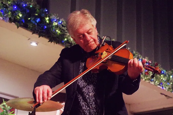 Framed Print : Mike Piggott, East Grinstead Jazz Club, Apron Cafe, Chequer Mead Theatre, West Sussex, April 2025. Creator: Brian O'Connor. Mike Piggott, East Grinstead Jazz Club, Apron Cafe, Chequer Mead Theatre, West Sussex, April 2025