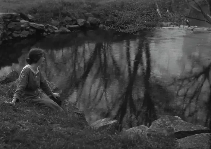 Framed Print : Millay, Edna St. Vincent, Miss, seated next to a pond, 1914. Creator: Arnold Genthe Framed Print : Millay, Edna St. Vincent, Miss, seated next to a pond, 1914. Creator: Arnold Genthe