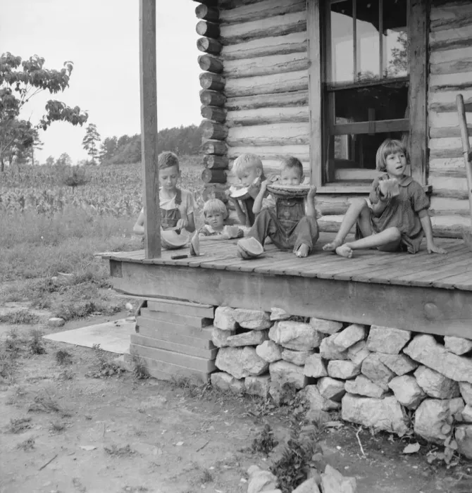 Framed Print : Millworkers children eating watermelon on porch... Person County, North Carolina, 1939. Creator: Dorothea Lange Framed Print : Millworkers children eating watermelon on porch... Person County, North Carolina, 1939. Creator: Dorothea Lange
