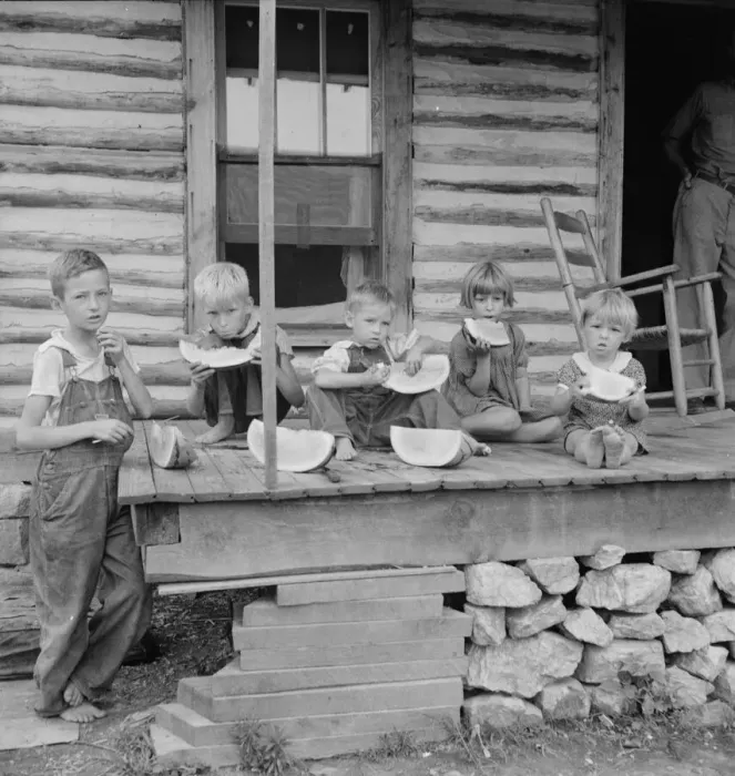 Framed Print : Millworkers children eating watermelon on porch of rented house, Person County, N Carolina, 1939. Creator: Dorothea Lange Framed Print : Millworkers children eating watermelon on porch of rented house, Person County, N Carolina, 1939. Creator: Dorothea Lange