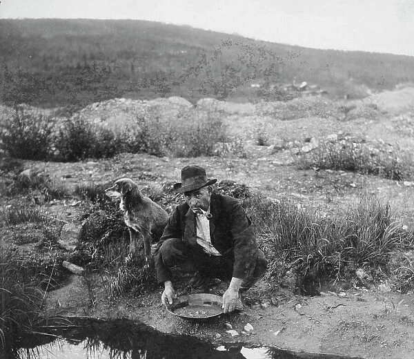 Miner panning gold, 1916. Creator: Unknown