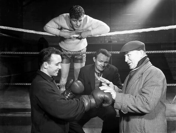A miner from Sunderland gets some ringside boxing advise, Newcastle, 1964. Artist