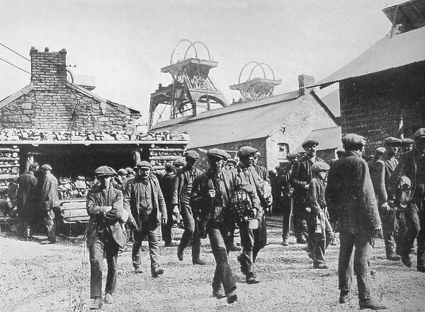 Miners leaving the pithead after the expiration of their strike notices, 1915