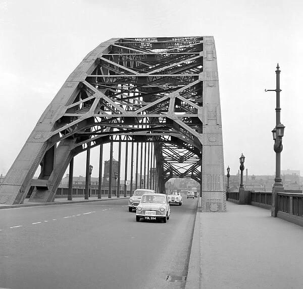 Mini on the 1959 Mobil Economy Run, Tyne Bridge in Newcastle. Creator: Unknown