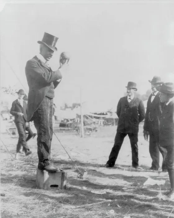 Framed Print : Minnesota State Fair: African American on soap box using hand puppet, 1900?. Creator: Unknown Framed Print : Minnesota State Fair: African American on soap box using hand puppet, 1900?. Creator: Unknown