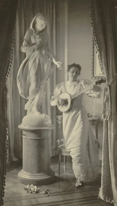 Framed Print : Miss Apperson playing banjo...Sen. George Hearst's residence, Washington, D.C. 1895. Creator: Frances Benjamin Johnston. Miss Apperson playing banjo...Sen. George Hearst's residence, Washington, D.C. 1895 Framed Print : Miss Apperson playing banjo...Sen. George Hearst's residence, Washington, D.C. 1895. Creator: Frances Benjamin Johnston. Miss Apperson playing banjo...Sen. George Hearst's residence, Washington, D.C. 1895