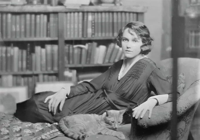 Framed Print : Miss Helen Chamberlain, with Buzzer the cat, portrait photograph, 1918 May 28. Creator: Arnold Genthe