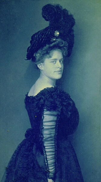 Miss Mary Olmsted(?) Clarke, half-length portrait, standing, facing right, c1903. Creator: Frances Benjamin Johnston