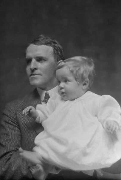 Mitchell, W.C. Mr. and baby, portrait photograph, 1914 May 22. Creator: Arnold Genthe