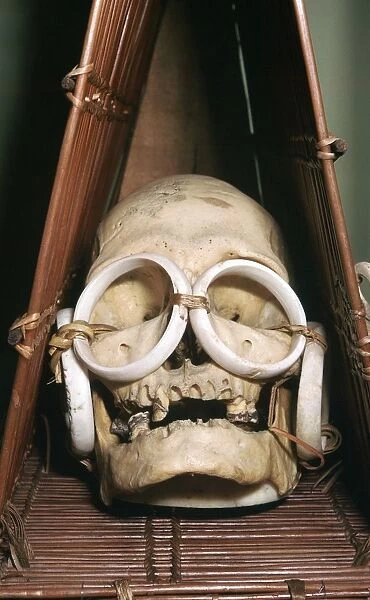 Model boat containing a chiefs skull from the Solomon Isles