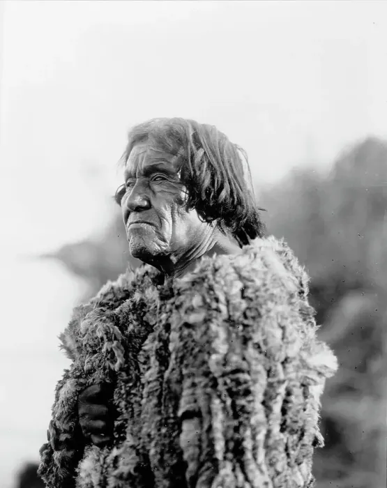 Framed Print : Mohave man, half-length portrait, facing left wearing primitive robe of rabbit skin, 1907. Creator: Edward Sheriff Curtis. Mohave man, half-length portrait, facing left wearing primitive robe of rabbit skin, 1907 Framed Print : Mohave man, half-length portrait, facing left wearing primitive robe of rabbit skin, 1907. Creator: Edward Sheriff Curtis. Mohave man, half-length portrait, facing left wearing primitive robe of rabbit skin, 1907