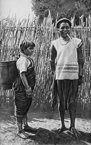 A Moi couple inside the village palisade, Africa, 1922