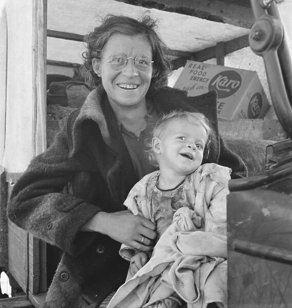 Mother and baby of family on the road, Tulelake, Siskiyou County, California, 1939. Creator: Dorothea Lange