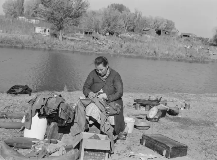 Framed Print : Mother of migrant family sewing, near Vale, Malheur County, Oregon, 1939. Creator: Dorothea Lange Framed Print : Mother of migrant family sewing, near Vale, Malheur County, Oregon, 1939. Creator: Dorothea Lange