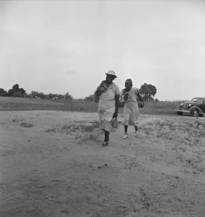 Framed Print : Mother of sharecropper family and friend... in the rain, Person County, North Carolina, 1939. Creator: Dorothea Lange Framed Print : Mother of sharecropper family and friend... in the rain, Person County, North Carolina, 1939. Creator: Dorothea Lange