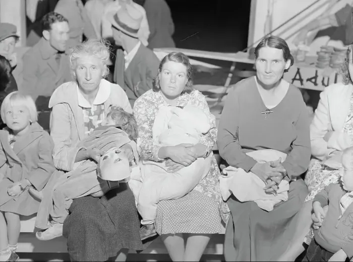 Framed Print : Mothers on the sidelines watch the Halloween party at Shafter migrant camp, California, 1938. Creator: Dorothea Lange Framed Print : Mothers on the sidelines watch the Halloween party at Shafter migrant camp, California, 1938. Creator: Dorothea Lange