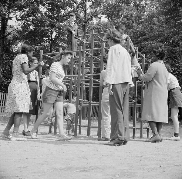 Mothers supervising their children at Camp Ellen Marvin, Arden, New York, 1943. Creator: Gordon Parks