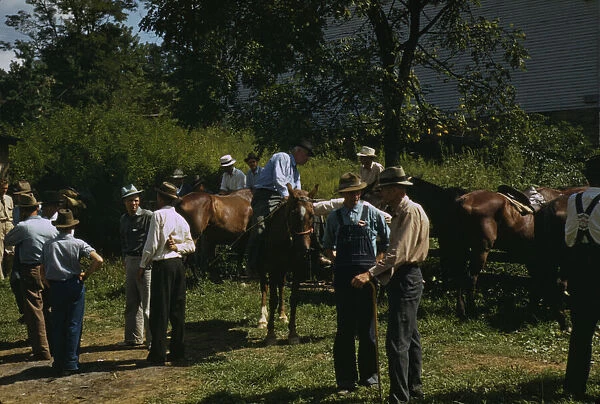 Mountaineers and farmers trading mules and horses on 'Jockey St. ', Campton, Wolfe County, Ky. 1940 Creator: Marion Post Wolcott