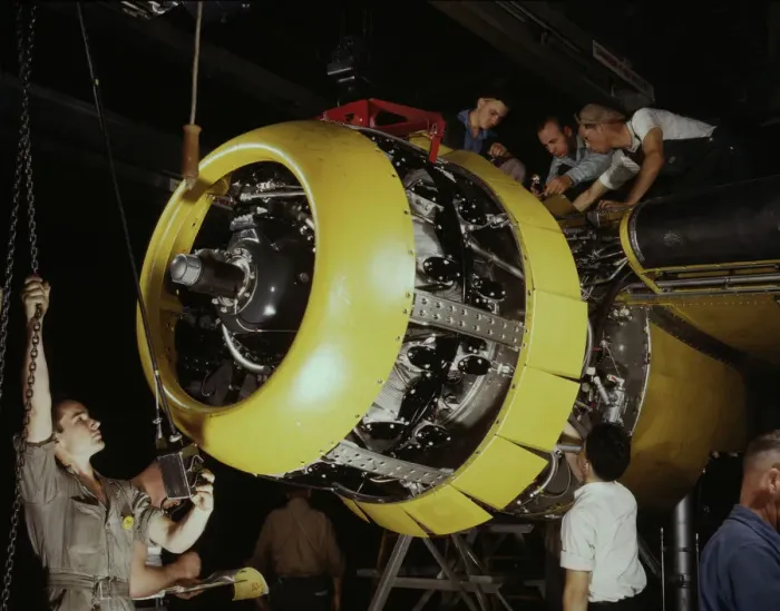 Framed Print : Mounting motor on a Fairfax B-25 bomber, North American Aviation, Inc. Inglewood, Calif. 1942. Creator: Alfred T Palmer Framed Print : Mounting motor on a Fairfax B-25 bomber, North American Aviation, Inc. Inglewood, Calif. 1942. Creator: Alfred T Palmer