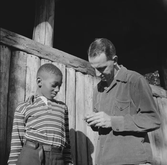 Framed Print : Mr. Lewis Traver, the director, with camper at Camp Nathan Hale, Southfields, New York, 1943 Creator: Gordon Parks Framed Print : Mr. Lewis Traver, the director, with camper at Camp Nathan Hale, Southfields, New York, 1943 Creator: Gordon Parks