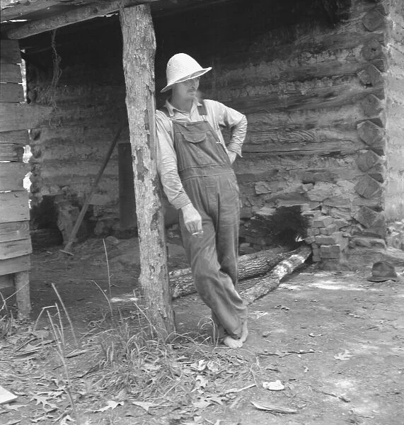 Mr. Taylor, tobacco sharecropper, relaxes when the... Granville County, North Carolina, 1939. Creator: Dorothea Lange