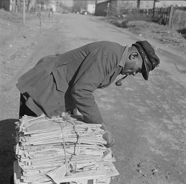 Mr. Venus Alsobrook, official salvage collector for the government, Washington, D. C. 1942. Creator: Gordon Parks