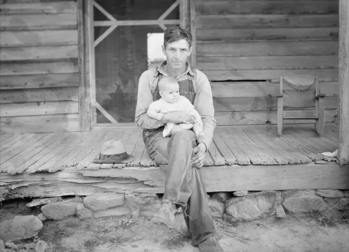 Framed Print : Mr. Whitfield, tobacco sharecropper, with baby on front porch, North Carolina, Person County, 1939. Creator: Dorothea Lange Framed Print : Mr. Whitfield, tobacco sharecropper, with baby on front porch, North Carolina, Person County, 1939. Creator: Dorothea Lange