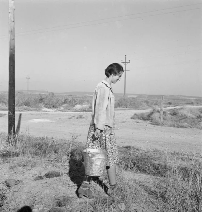 Framed Print : Mrs. Bartheloma hauls water from irrigation ditch, Nyssa Heights, Malheur County, Oregon, 1939. Creator: Dorothea Lange Framed Print : Mrs. Bartheloma hauls water from irrigation ditch, Nyssa Heights, Malheur County, Oregon, 1939. Creator: Dorothea Lange