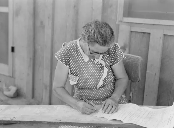 Framed Print : Mrs. Cates signs chattel mortgage with X, Malheur County, Oregon, 1939. Creator: Dorothea Lange Framed Print : Mrs. Cates signs chattel mortgage with X, Malheur County, Oregon, 1939. Creator: Dorothea Lange
