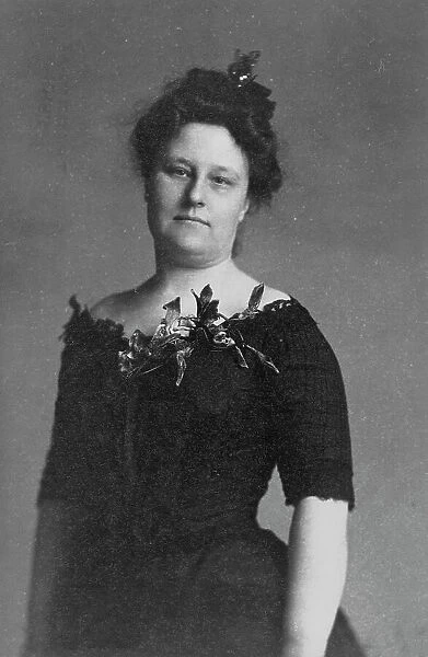 Mrs. Crabbe, half-length portrait, standing, facing front, between c1890 and 1910. Creator: Frances Benjamin Johnston