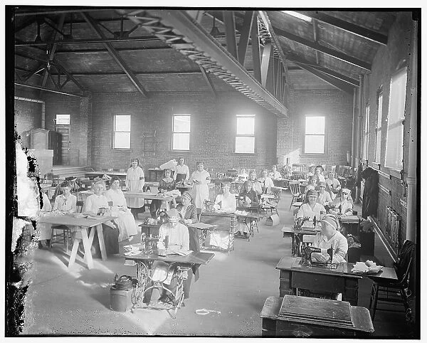 Mrs. Doyen's Red Cross workroom, between 1910 and 1920. Creator: Harris & Ewing. Mrs. Doyen's Red Cross workroom, between 1910 and 1920. Creator: Harris & Ewing