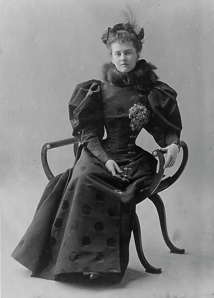 Mrs. Elizabeth Cameron, full-length portrait, seated, facing front, between c1890 and c1910. Creator: Frances Benjamin Johnston