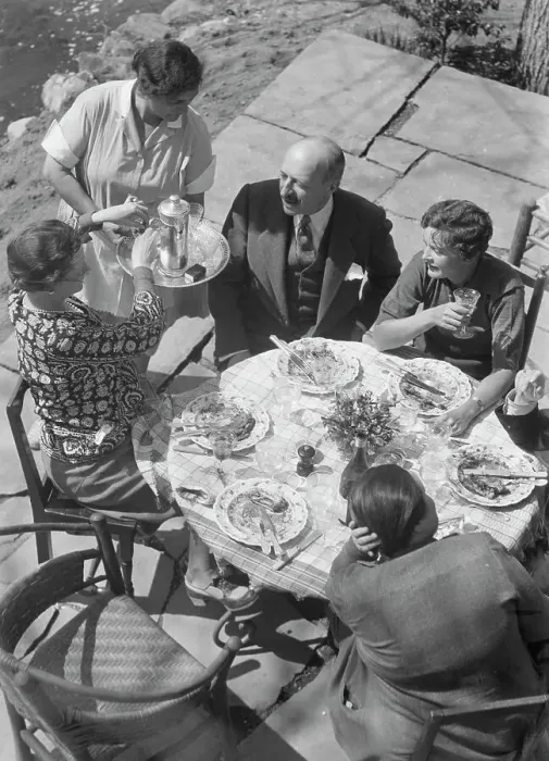 Framed Print : Mrs. Mary Benson and other people seated outdoors, 1933. Creator: Arnold Genthe Framed Print : Mrs. Mary Benson and other people seated outdoors, 1933. Creator: Arnold Genthe