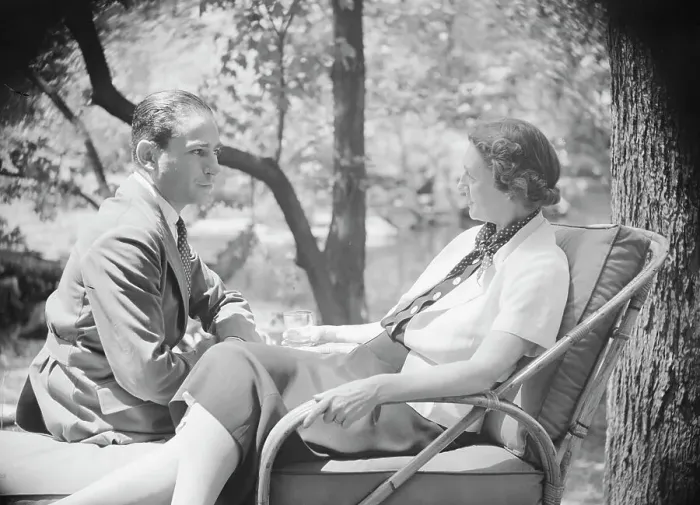 Framed Print : Mrs. Mary Benson and unidentified man, seated outdoors, 1933. Creator: Arnold Genthe