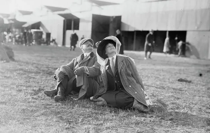 Framed Print : Mrs. Payne Whitney with unidentified gentleman seated on flying field of aviation meet, 1910. Creator: Bain News Service Framed Print : Mrs. Payne Whitney with unidentified gentleman seated on flying field of aviation meet, 1910. Creator: Bain News Service